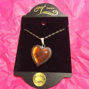 ‘Caroline’ locket necklace.